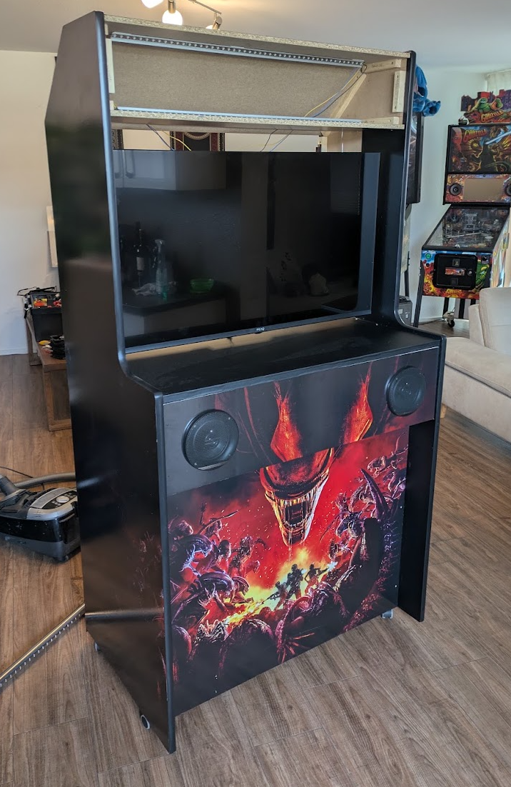 Cabinet with decals applied and the first installations such as speakers, TV etc.